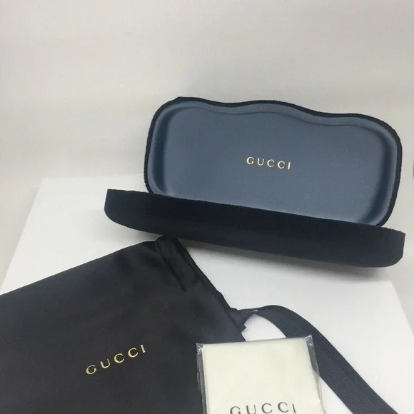 Gucci Black and Gold Rimless Glasses
